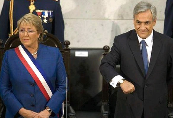 Foto EFE - Bachelet y Pi�era